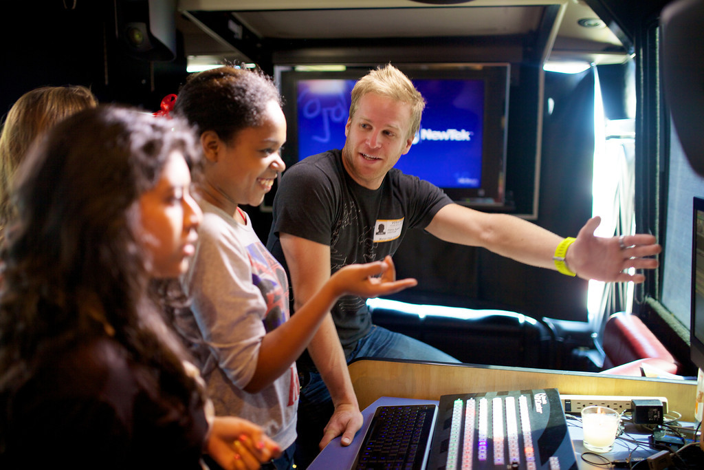 Manor HS TX students train at the TriCaster on the Lennon Bus.